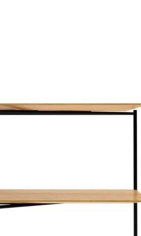 Schwarzes Board mit markanter Holzstruktur vor heller Wand: Rundstahl ist präzisionsgeschweißt für absolute Formstabilität – Schadstoffgeprüft.